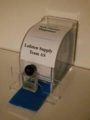 Dispenser for bandasjeplaster